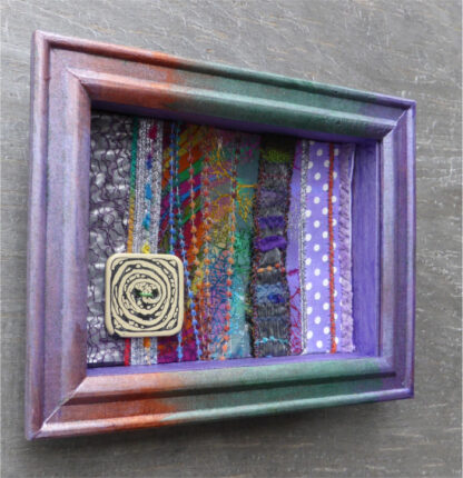 framed textile art by McAnaraks